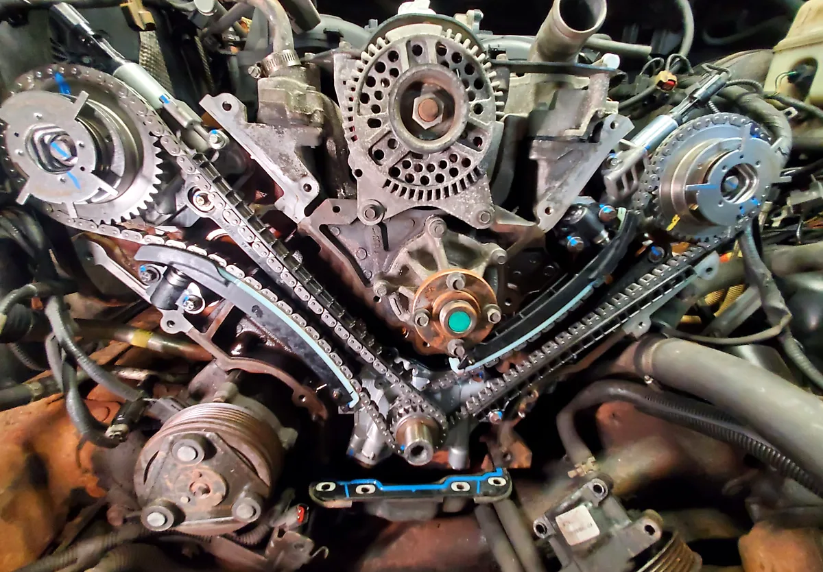 Engine timing chains and components exposed during repair